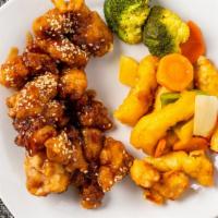 Dragon Phoenix · Crispy honey sesame chicken and crispy sweet and sour chicken with rice.