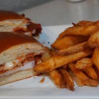 Chicken Parmesan Sandwich · Breaded chicken topped with pomodoro sauce and melted mozzarella cheese on a brioche bun.