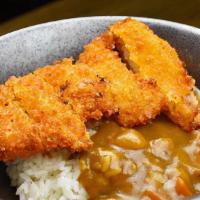 Curry Chicken Katsu · Japanese breaded and fried chicken cutlet over rice with curry sauce.
Served with salad and ...