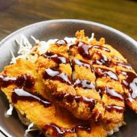 Tonkatsu · Japanese breaded and fried pork cutlet over rice with tonkatsu sauce.
Served with salad and ...