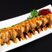 Lion King Roll · IN shrimp tempura, crabmeat, avocado 
OUT baked salmon, masago, green onion, spicy mayo, eel...