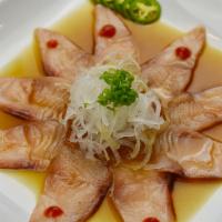Yellowtail Heaven · Thinly sliced yellowtail and ponzu sauce.