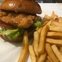 Honey Mustard Fried Chicken Sandwich · Breaded fried chicken breast on toasted Brioche bun with honey mustard, pickles and onions