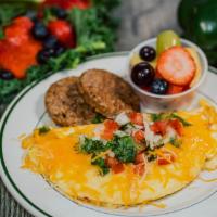 3 Egg Omlette · 3 scrambled eggs with  cheese, 2 slices wheat toast plus topping.
choose 1:
2 slices bacon
2...