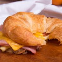 Breakfast Croissant  · Croissants served with egg (scrambled or fried), cheese bacon, ham  or sausage