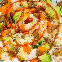 Beef Bowl · Teriyaki beef with steam (cabbage, carrots, and broccoli) and rice. Consuming raw or uncooke...