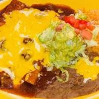 Beef Or Chicken Enchiladas · Served with rice, beans, and tortillas. Consuming raw or uncooked meats, poultry, seafood or...
