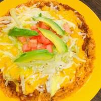 Dink Special · Comes with your choice of ground beef, shredded chicken, or carne guisada, rice, chile con c...