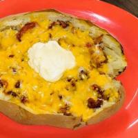 Plus Potato · Comes with bacon, cheese, butter, sour cream, and chives. Consuming raw or uncooked meats, p...