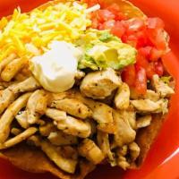 Fajita Taco Salad Plate · Taco shell with lettuce, diced tomatoes, cheese, guacamole, sour cream, and (with your choic...