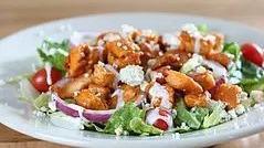 Classic Grilled Chicken · Grilled chicken breast on romaine - tomato - cucumber onions - croutons shredded Cheddar. Se...