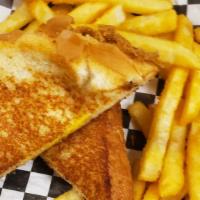 Kids Grilled Cheese · Kids Grilled Cheese served with fries or fresh fruit and a drink.