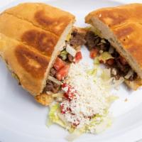 Tortas · Mexican bun toasted with your choice of meat, beans, sour cream, lettuce, tomato, avocado.