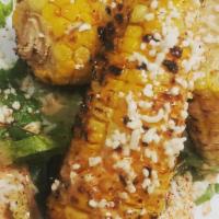 Grilled Corn Street · Chipotle mayo, Cotija queso and chile lime salt.