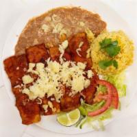 Enchiladas Montados · 4 of our delicious enchiladas, that are topped with 2 eggs! Comes with a side of home fries ...
