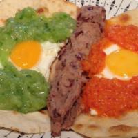 Divorciados · 2 eggs that are topped with our delicious red and green salsa! Comes with a side of refried ...