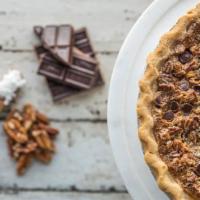 I-40 · Pecans, chocolate chips, a sprinkle of toasted coconut, and a smooth pecan pie filling combi...