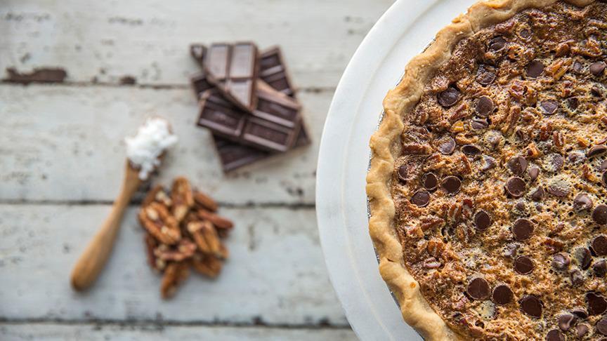 I-40 · Pecans, chocolate chips, a sprinkle of toasted coconut, and a smooth pecan pie filling combined in a sweet shortbread crust
