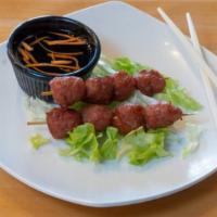 A6 Grilled Pork Bbq Meatballs (2 Skewers) · Two skewers of marinated meatballs deep fried to perfection. Served with house special sauce.