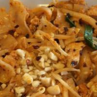Chicken Pad Thai Flat Noodles · Stir fried flat rice noodles with chicken breast, shredded carrots, onions, bean sprouts, ci...