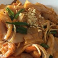 Shrimp Pad Thai Flat Noodles · Stir fried flat rice noodles with shrimp, carrots, onions, bean sprouts, cilantro and topped...