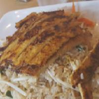 Grilled Chicken Fried Rice · Grilled marinated chicken breast served over egg fried rice. Comes with green onions.