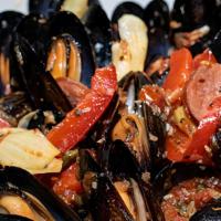 Mussels Barcelona · One pound of Chilean mussels tossed in a spicy marinara, Andouille sausage, white wine, red ...