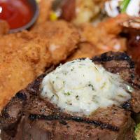 Surf & Turf · Large Shrimp and an Aged 8oz. beef tenderloin filet seasoned with our signature Rockfish spi...