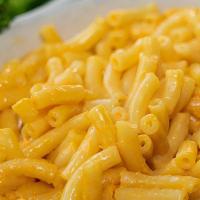 Mac & Cheese · Kraft® Macaroni and Cheese served with choice of one side item.