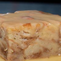 Bread Pudding · Homemade bread pudding topped with our sweet bourbon butter sauce.