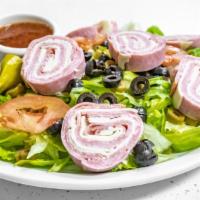 Chef'S Salad · Genoa salami, ham, turkey and provolone cheese served on a bed of romaine/iceberg blend lett...