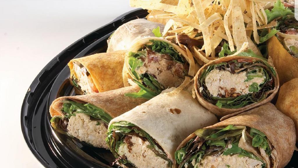 Chipotle Chicken · Fresh greens, shredded chicken, tomatoes, jack cheese and toasted pecans. Mixed with zesty chipotle cream dressing and topped with crispy tortilla strips.