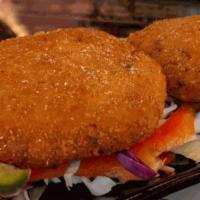 Veg Tikki · Crispy patty made with minced paneer, spinach, carrot and vegetables. GF