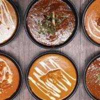 Tikka Masala · Tomato creamy curry sauce made to perfection with your choice of protien served with a side ...