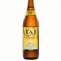 22Oz Taj Mahal Lager · Taj Mahal | India | Pale Lager style beer, medium in color, is slightly hoppy and has an ABV...