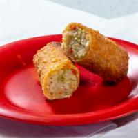 Vegetable Egg Roll (1 Roll) · A deep fried roll stuffed with mixed vegetables.