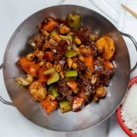 Kung Pao · Spicy.  Celery, carrots, peanuts and your choice of protein in kung pao sauce.