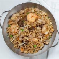 Combo Fried Rice · Fried rice with peas, carrots, onions, bean sprouts, egg, beef, chicken & shrimp.