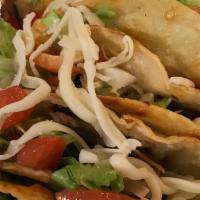 Fried Tacos · Three corn tacos of shredded beef, ground beef or chicken with rice and beans.