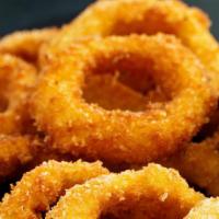 Onion Rings · Breaded onion rings served with Chipotle Ranch dipping sauce.