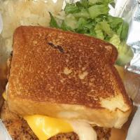 Deep Fried Chicken Sandwich · Boneless skinless chicken breast fried at it's best in gourmet batter, American cheese and t...