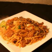 Lo Mein · Stir-fried egg noodles, carrots, baby corn, broccoli, water chestnuts, bean sprouts, snowpea...