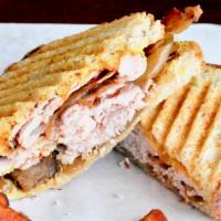 Black Betty · Boar's Head shaved turkey breast, hickory smoked bacon, cheddar cheese, caramelized onion, a...