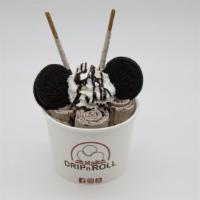 Cookie N' Cream · Vanilla ice cream mix in with oreos, topped with whipped cream, Oreos, cookies and cream poc...