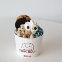 Cookie Monster · Blue ice cream mix with cookie dough pieces and oreo, topped with whipped, oreo, cookie doug...