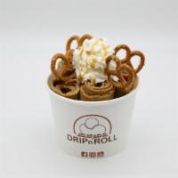 Sea Salt Caramel · Salted caramel pretzel ice cream, topped with whipped cream, salted pretzels and caramel dri...