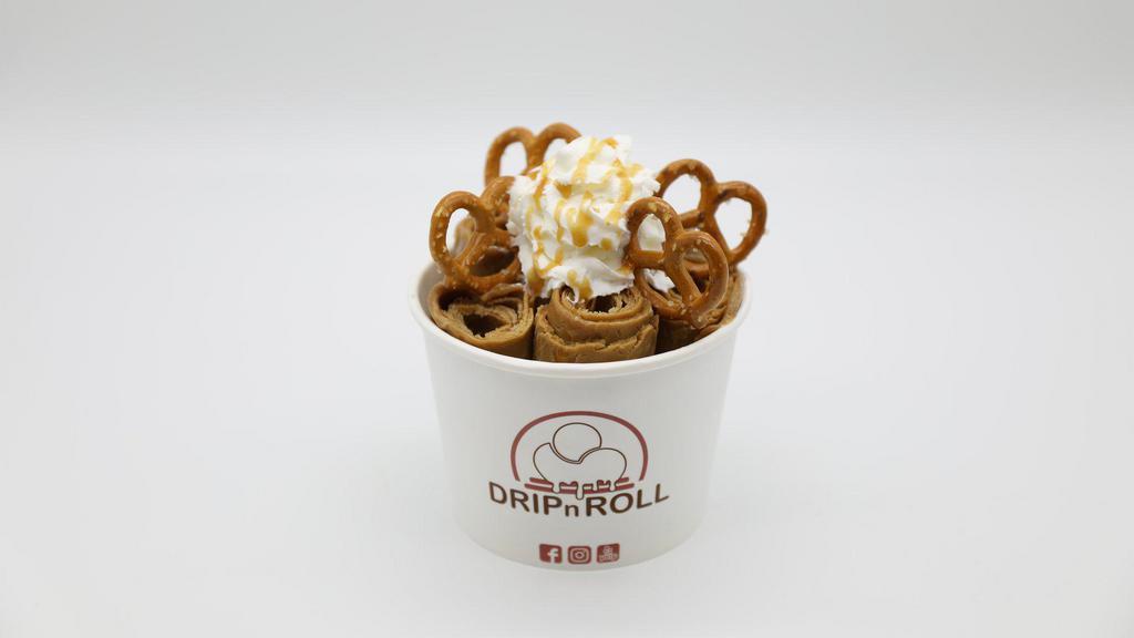 Sea Salt Caramel · Salted caramel pretzel ice cream, topped with whipped cream, salted pretzels and caramel drizzle