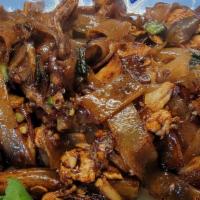 Char Kueh Tiao (Flat Rice Noodle Stir Fry) · Flat rice noodles stir fry with soy seasonings and blended with choice of meat, tofu and bea...