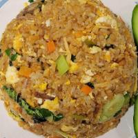 Nasi Goreng Kari (Fried Rice W/Curry) · Fried rice with curry seasoning. Add your choice of meats in the modifier.