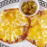 Bean & Cheese Nachos · Two crispy tortillas covered with vegetarian refried beans and mixed cheese with a side of j...